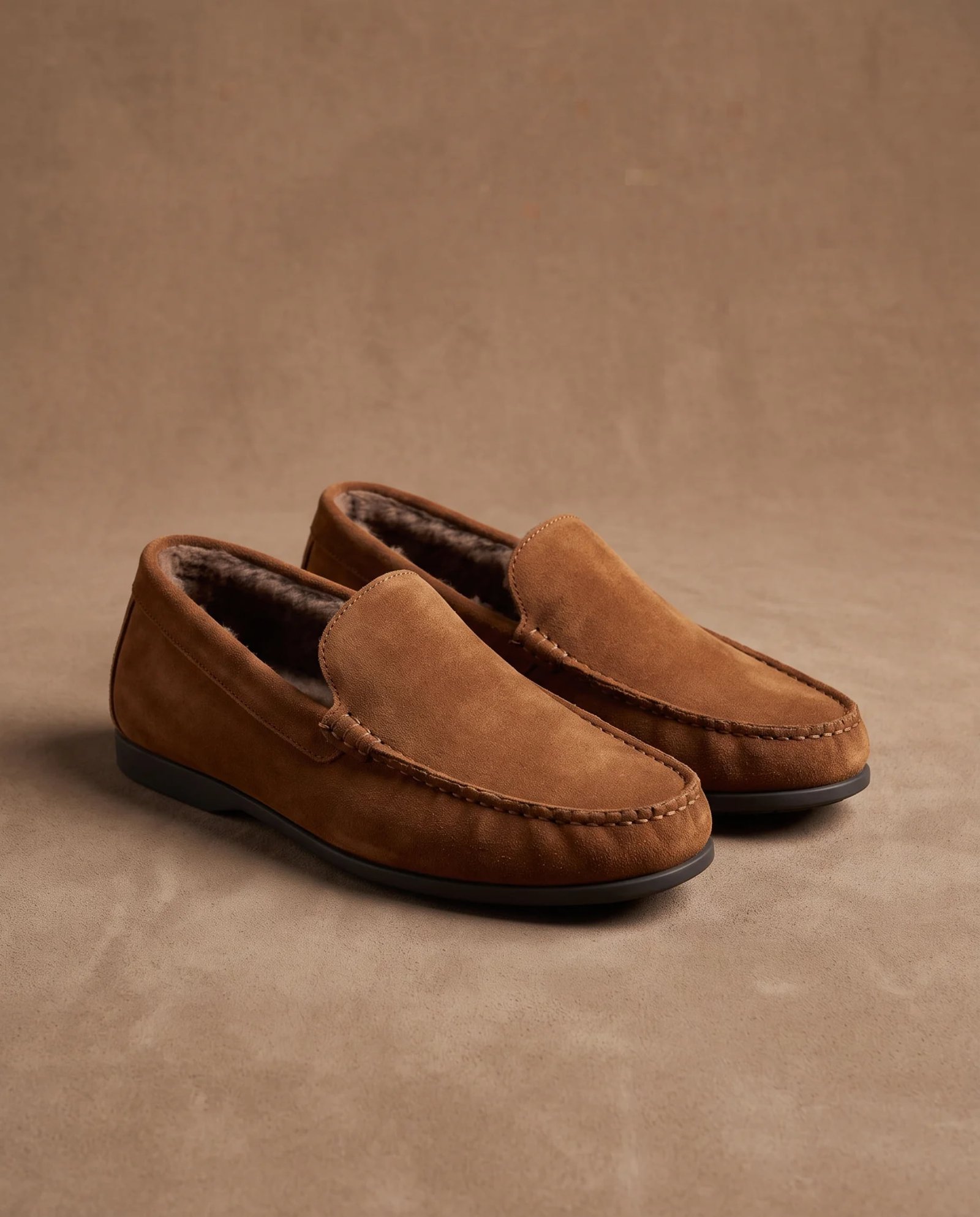 Brown suede moccasin slippers